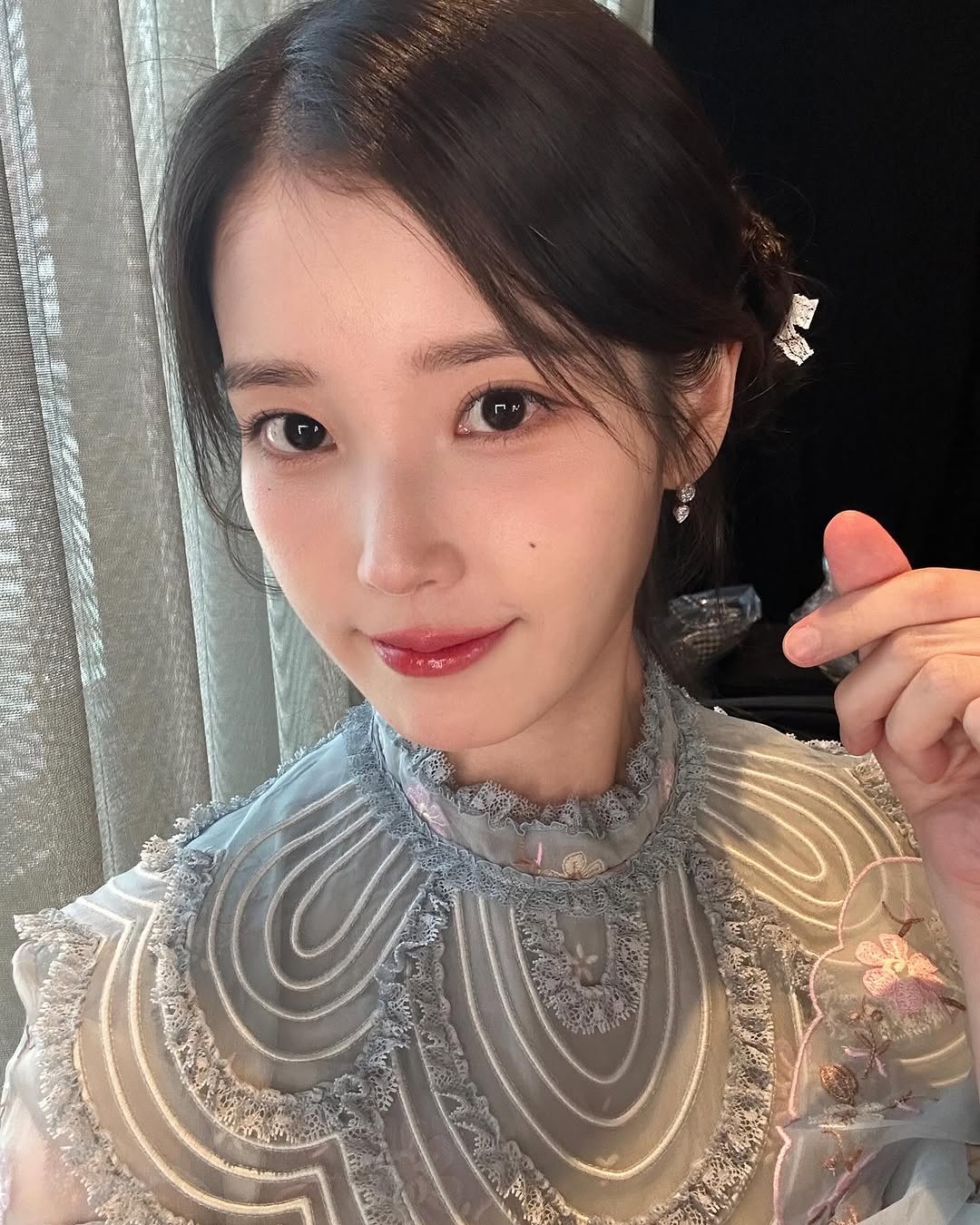 IU