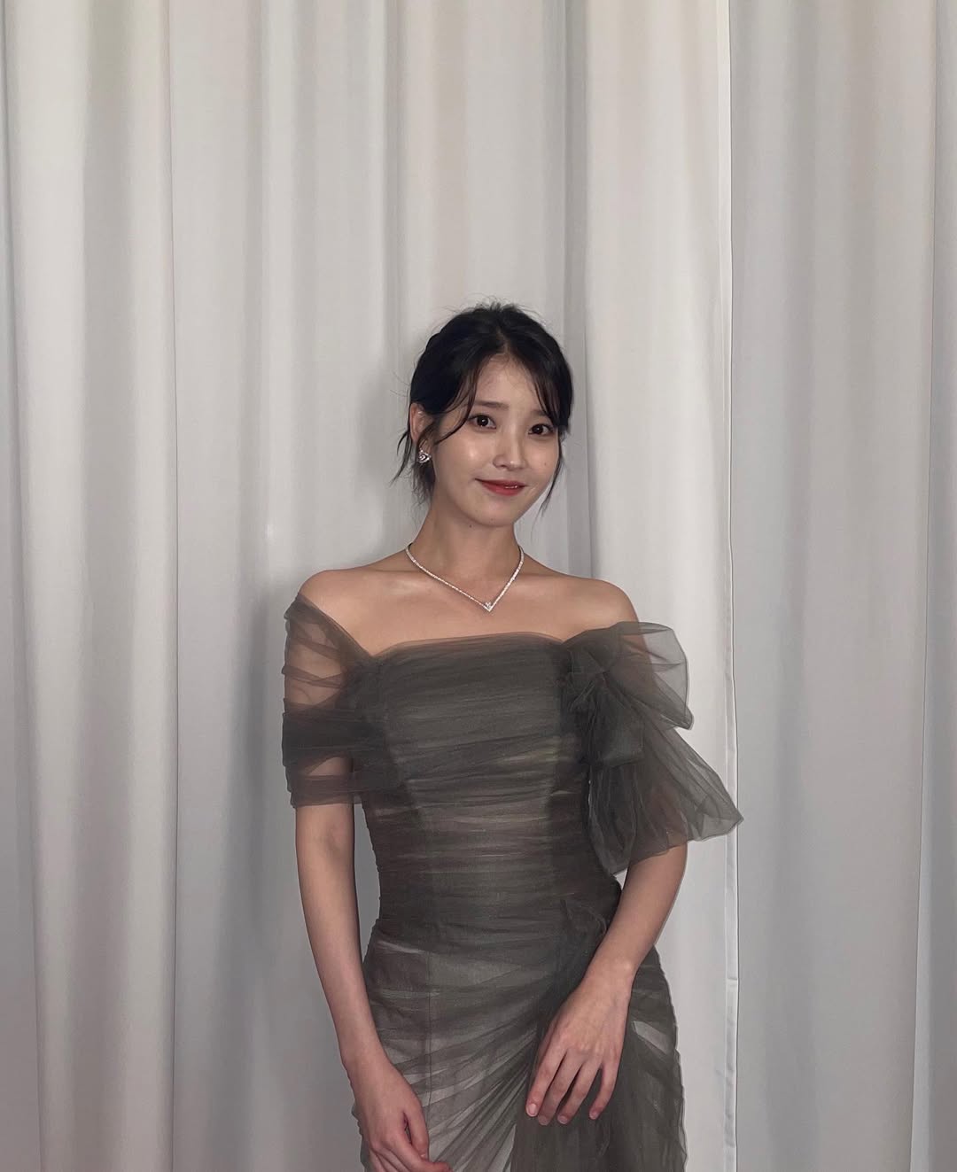 IU