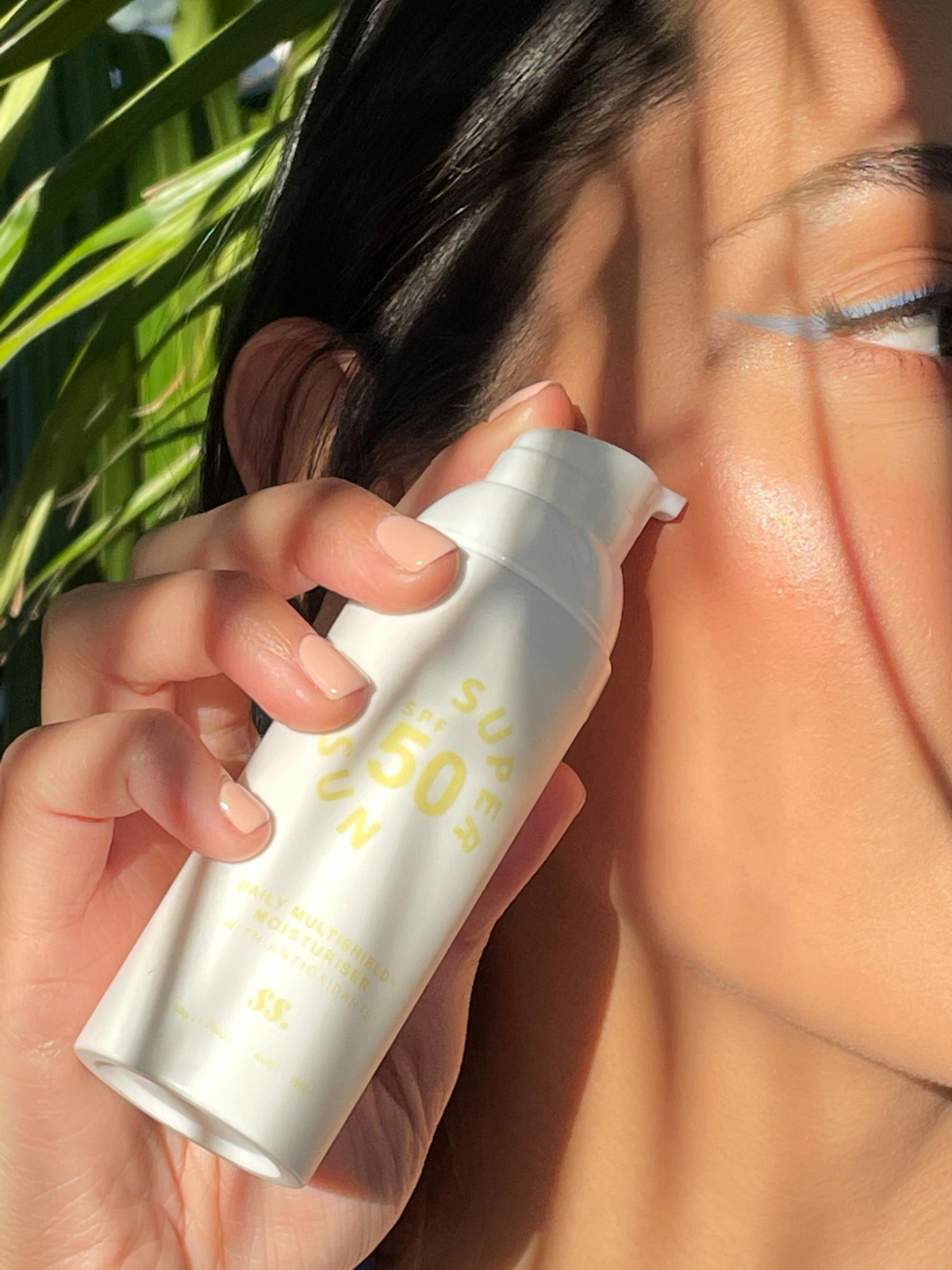 Memakai sunscreen